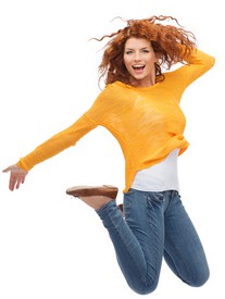 smiling young woman jumping in air